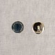 Two round, 21mm enamelled metal buttons, one blue and one silver.