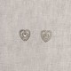 Two silver heart-shaped buttons with rhinestones.