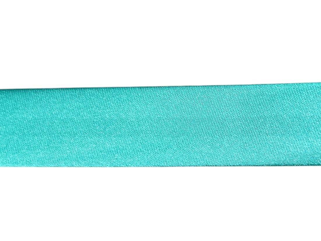 A close-up of a single-fold teal satin bias binding tape against a white background.