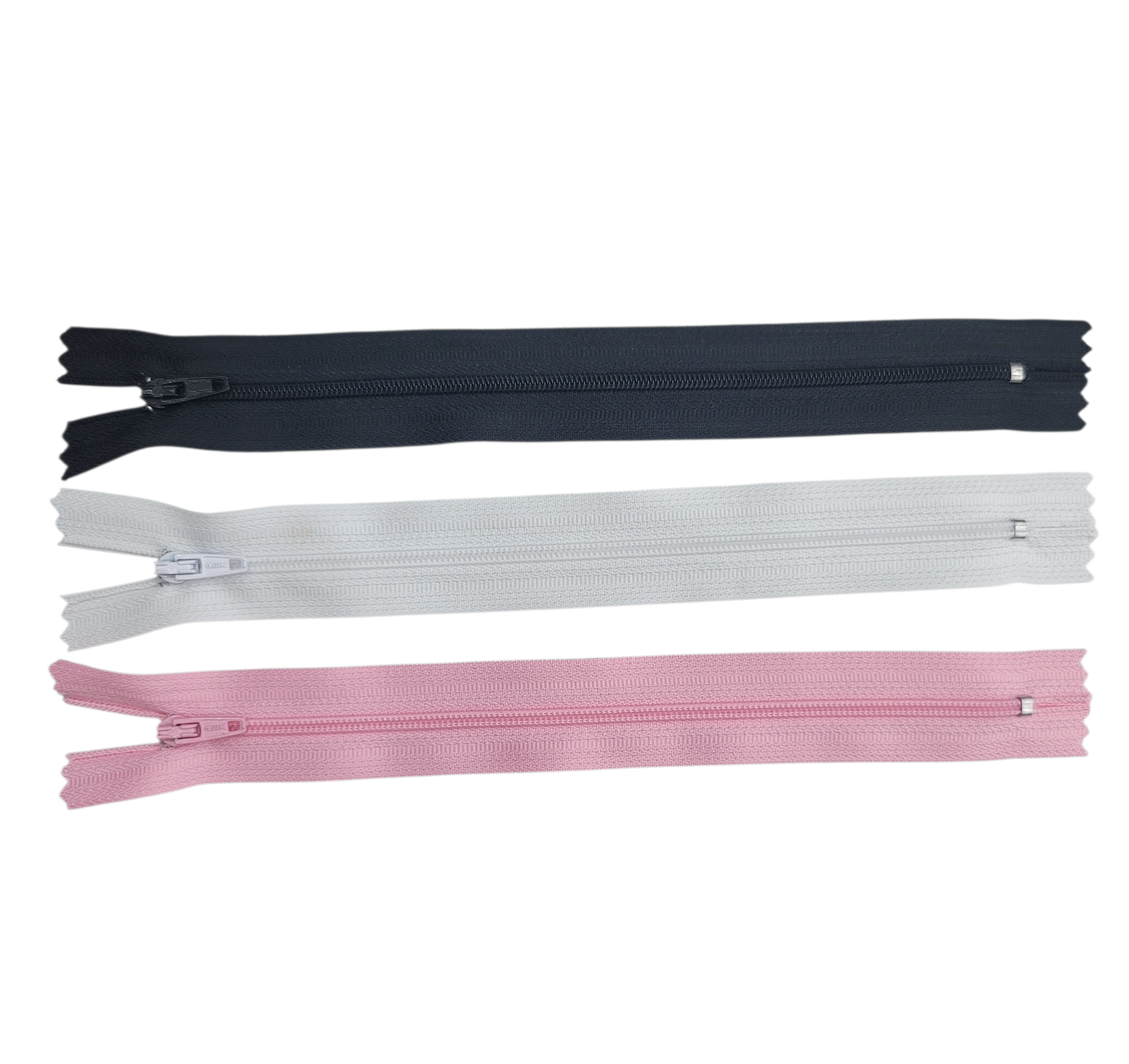 Three 20cm closed-ended PEX coil zippers in black, white, and pink on a white background.