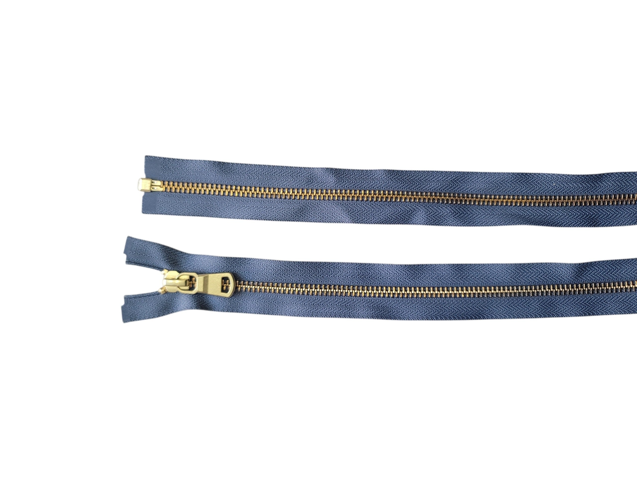 YKK size 5 gold metal open end zipper with navy blue tape and 73cm length.