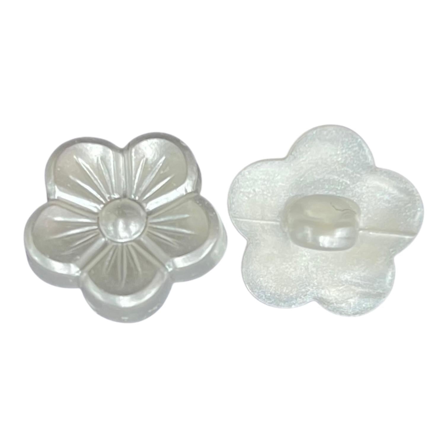 Two silvery white flower-shaped pearlised sewing buttons showing the front and shank back.