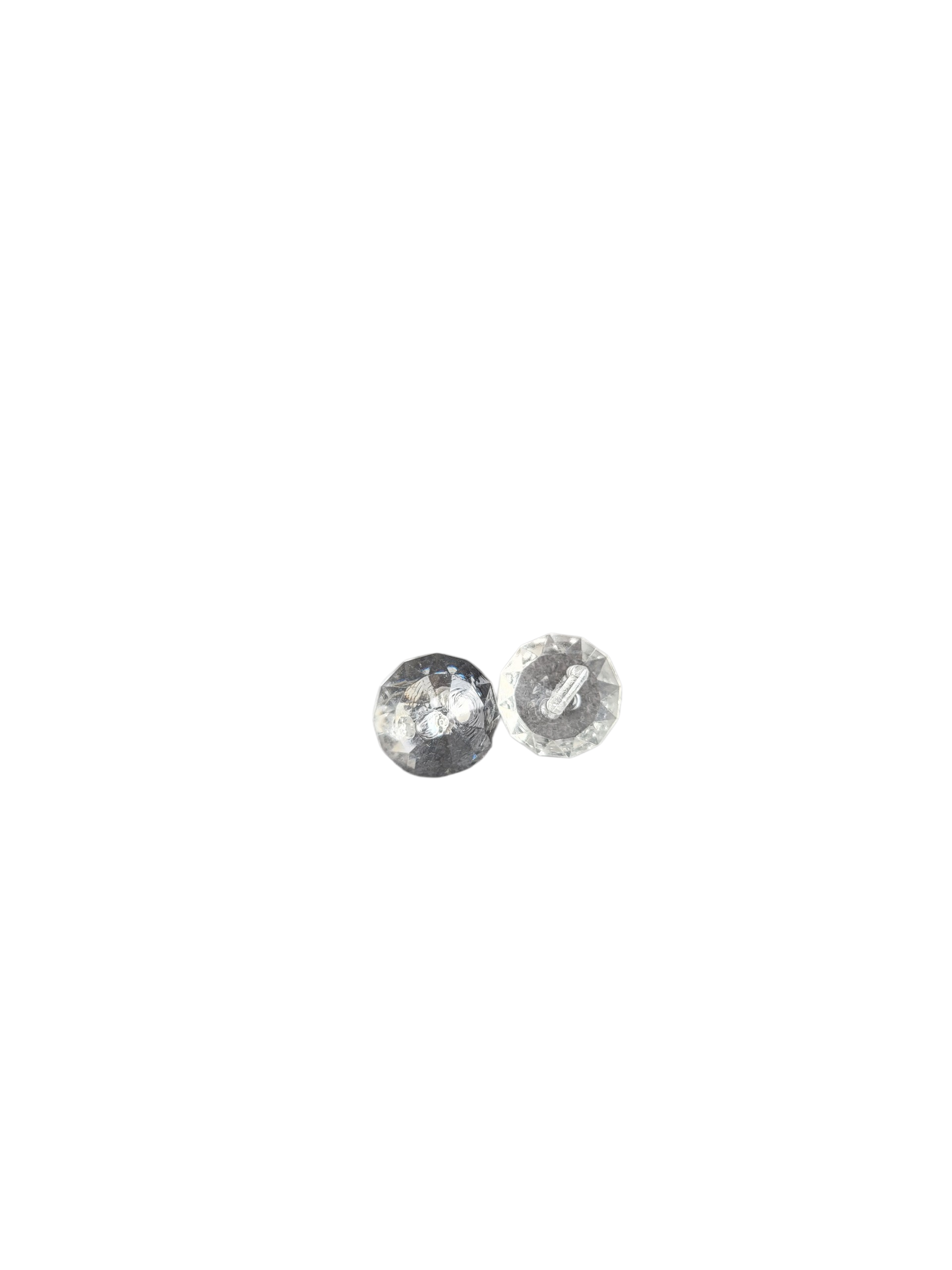 Two clear, diamond-shaped faceted shank buttons are shown against a white background.