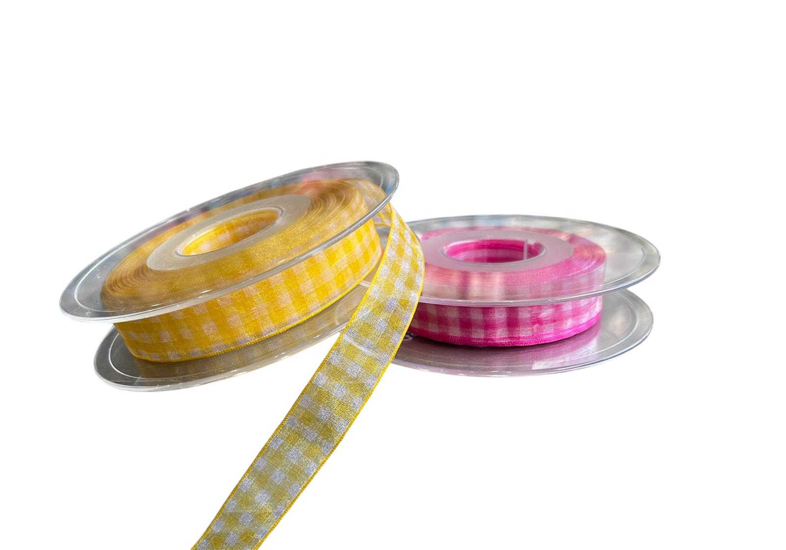 Two rolls of 15mm checkered sheer nylon ribbon in yellow and pink on clear plastic spools.