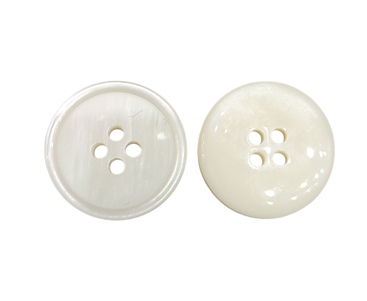 Two iridescent pearl imitation sewing buttons with four holes, showing front and back views.