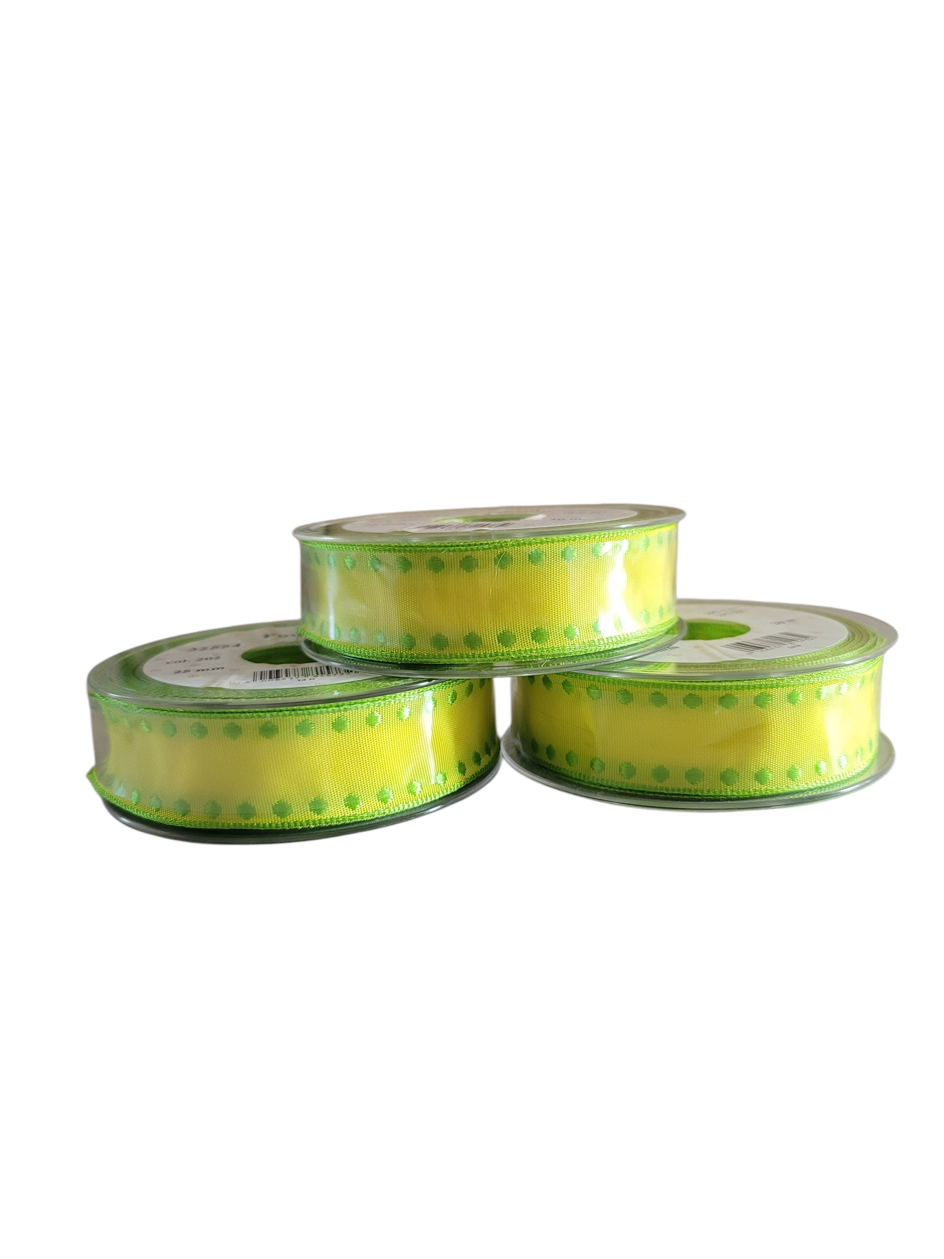 Three rolls of 25mm wide yellow ribbon with green polka dot borders stacked on a white background.