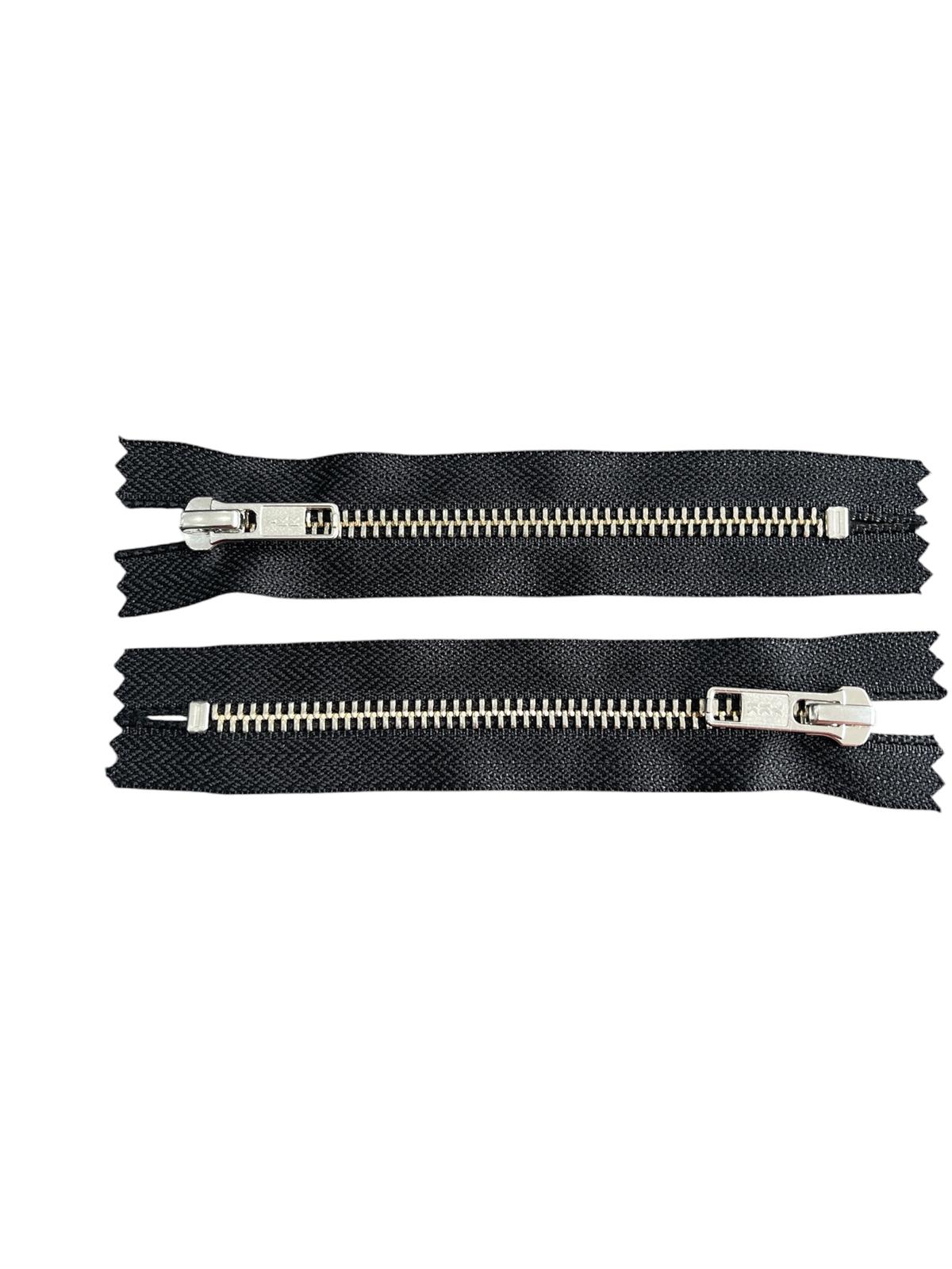 Two YKK size 5 closed end zips in black with silver metal teeth and sliders.