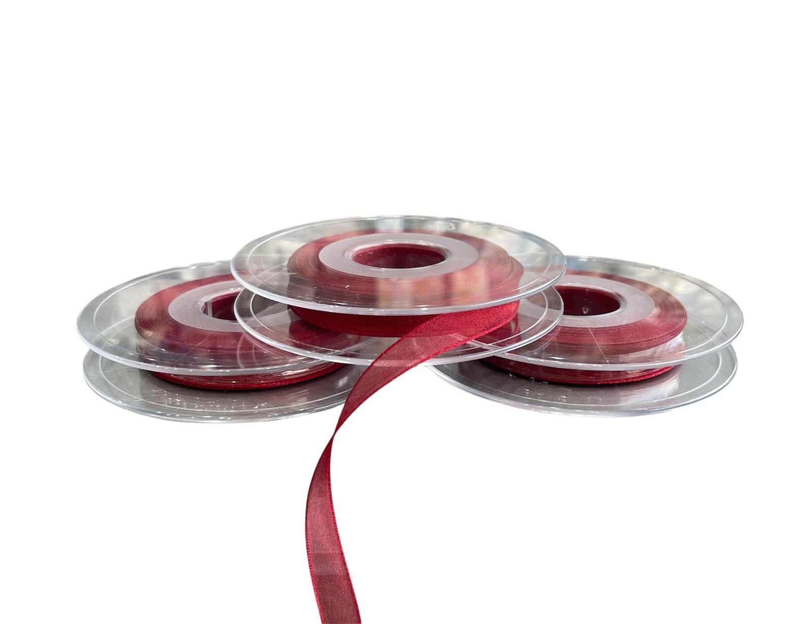 Three rolls of 10mm wine red sheer nylon ribbon on clear plastic spools.