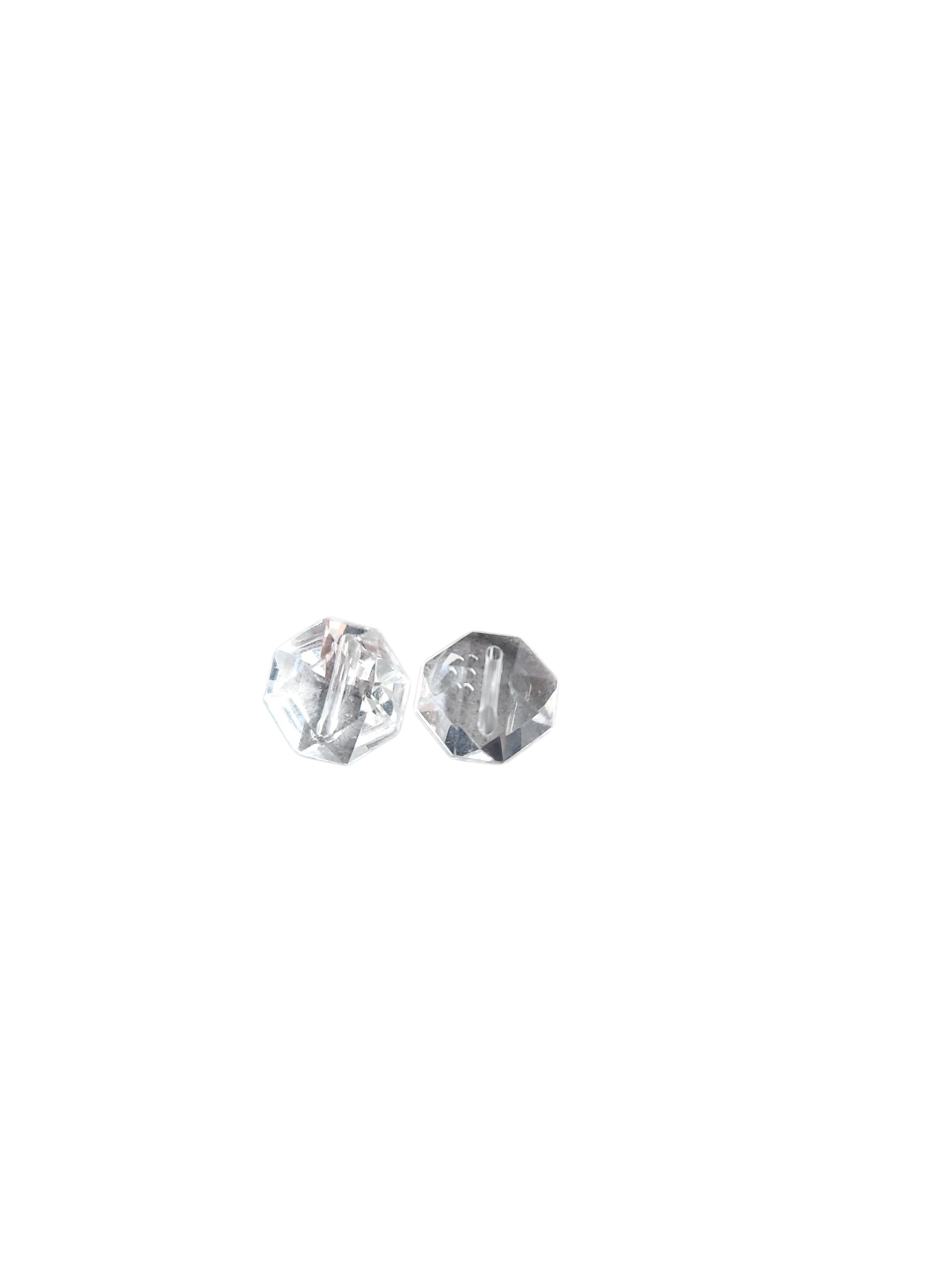 Two clear, diamond-shaped shank buttons with faceted surfaces are shown against a white background.