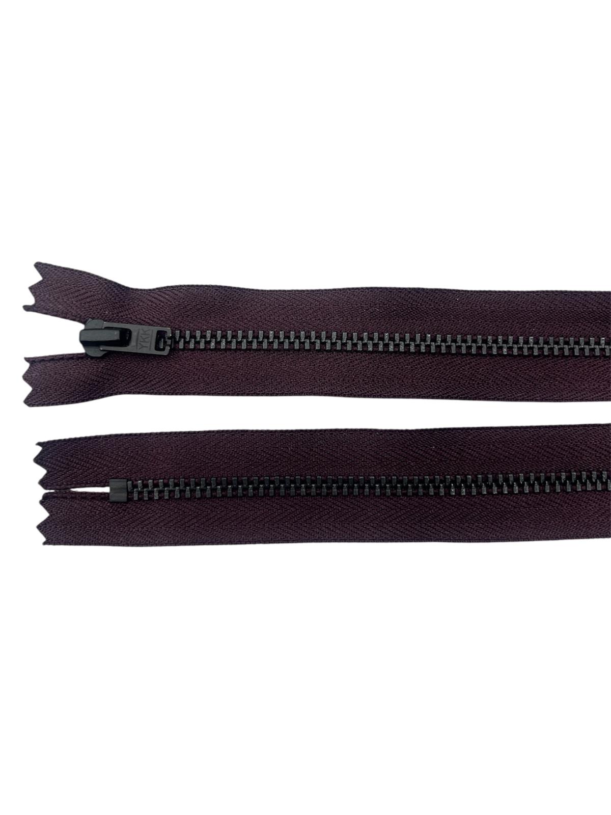 Black YKK size 3 closed-end metal zipper on dark purple tape.