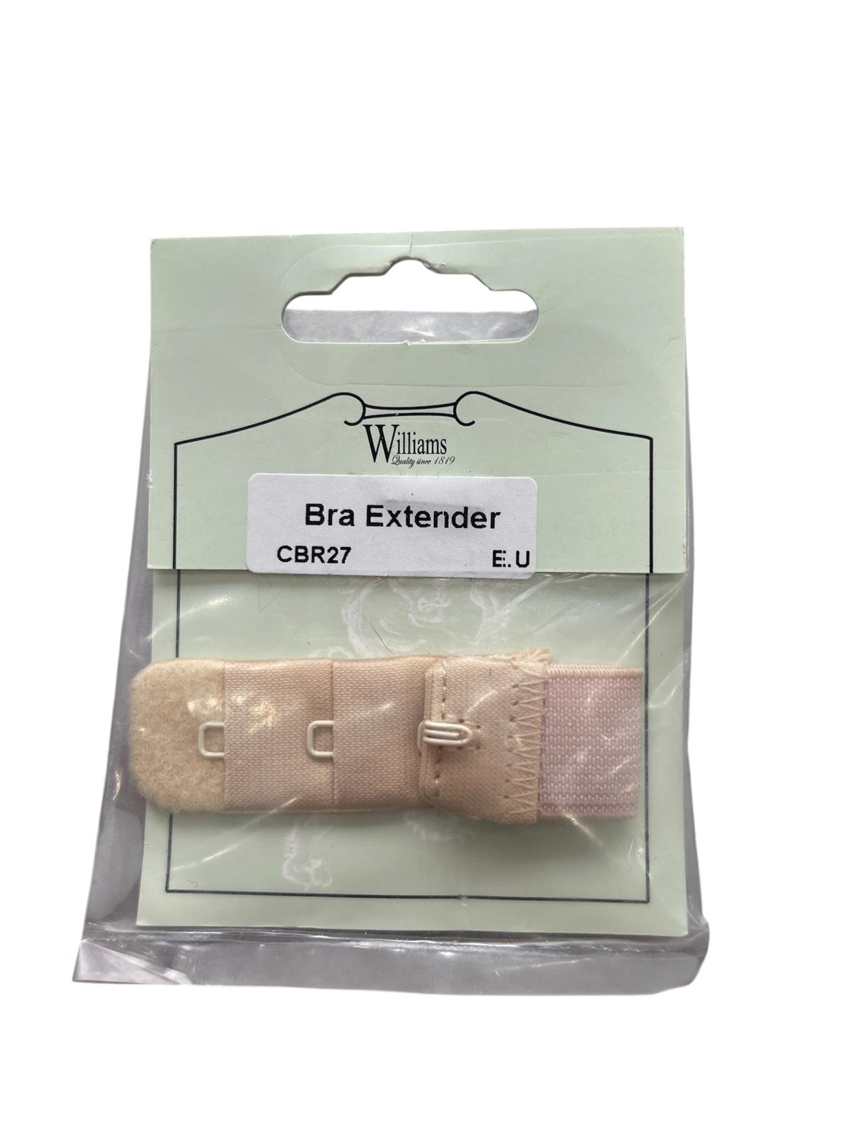 Williams nude elastic bra extender with metal hooks in its original clear plastic packaging.
