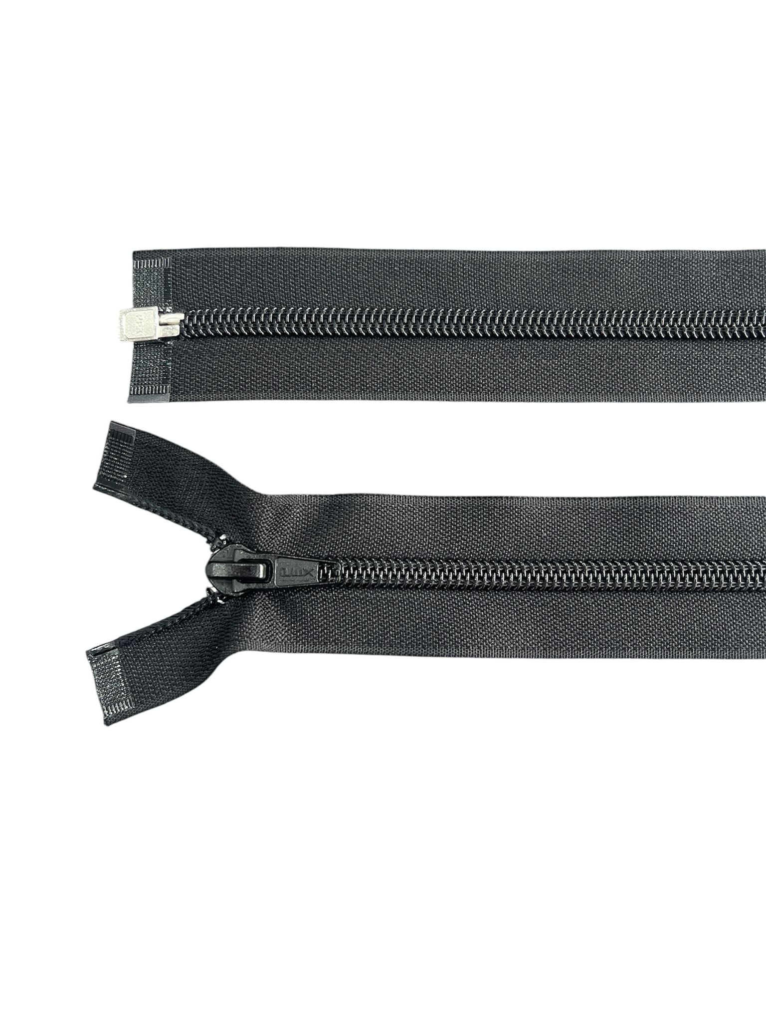 PEX size 7 black plastic open end zip showing the top stop and slider on a black tape.