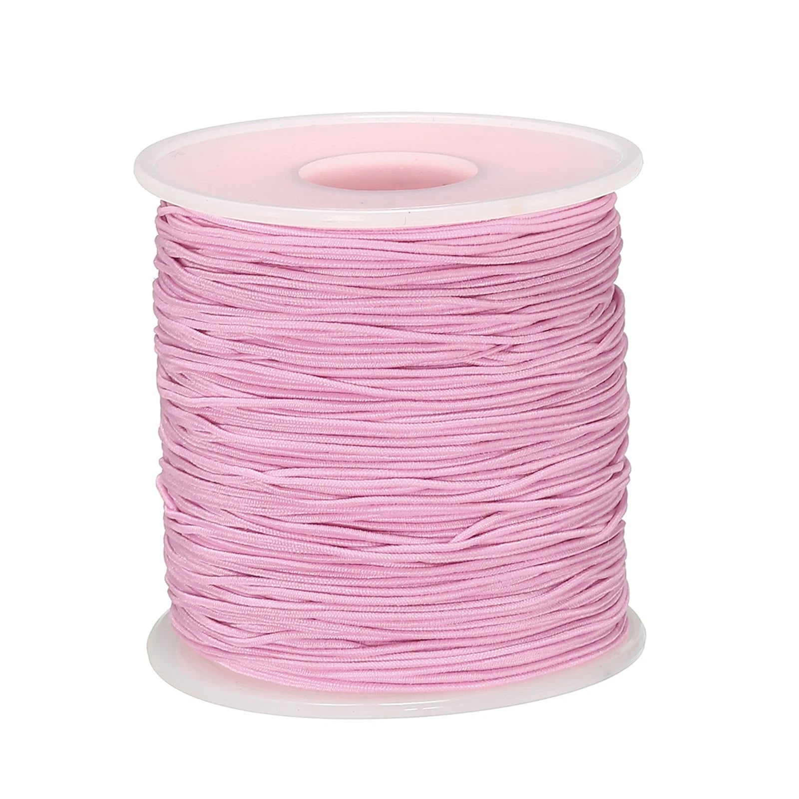 A spool of pink Beadalon colored elastic cord for jewelry making on a white background.