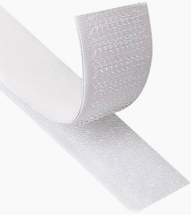 White 20mm hook and loop Velcro tape showing the hook side peeling away from the loop side.